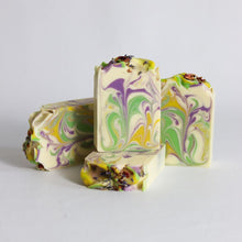 Load image into Gallery viewer, Colorful marbled soap bars on a light gray background
